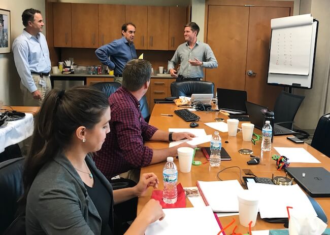 Howard Slone presents invention to team of judges in CC Innovation Symposium